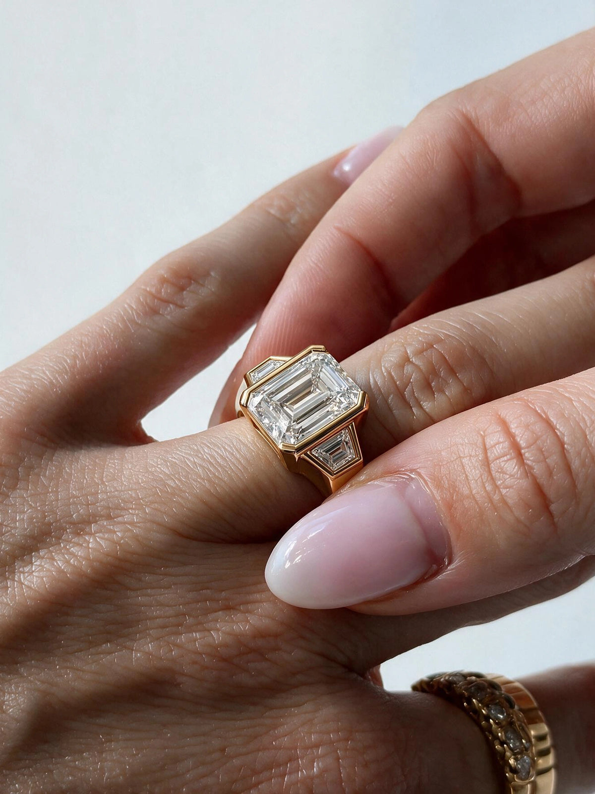 Emerald & Trapezoid Diamond Engagement Ring